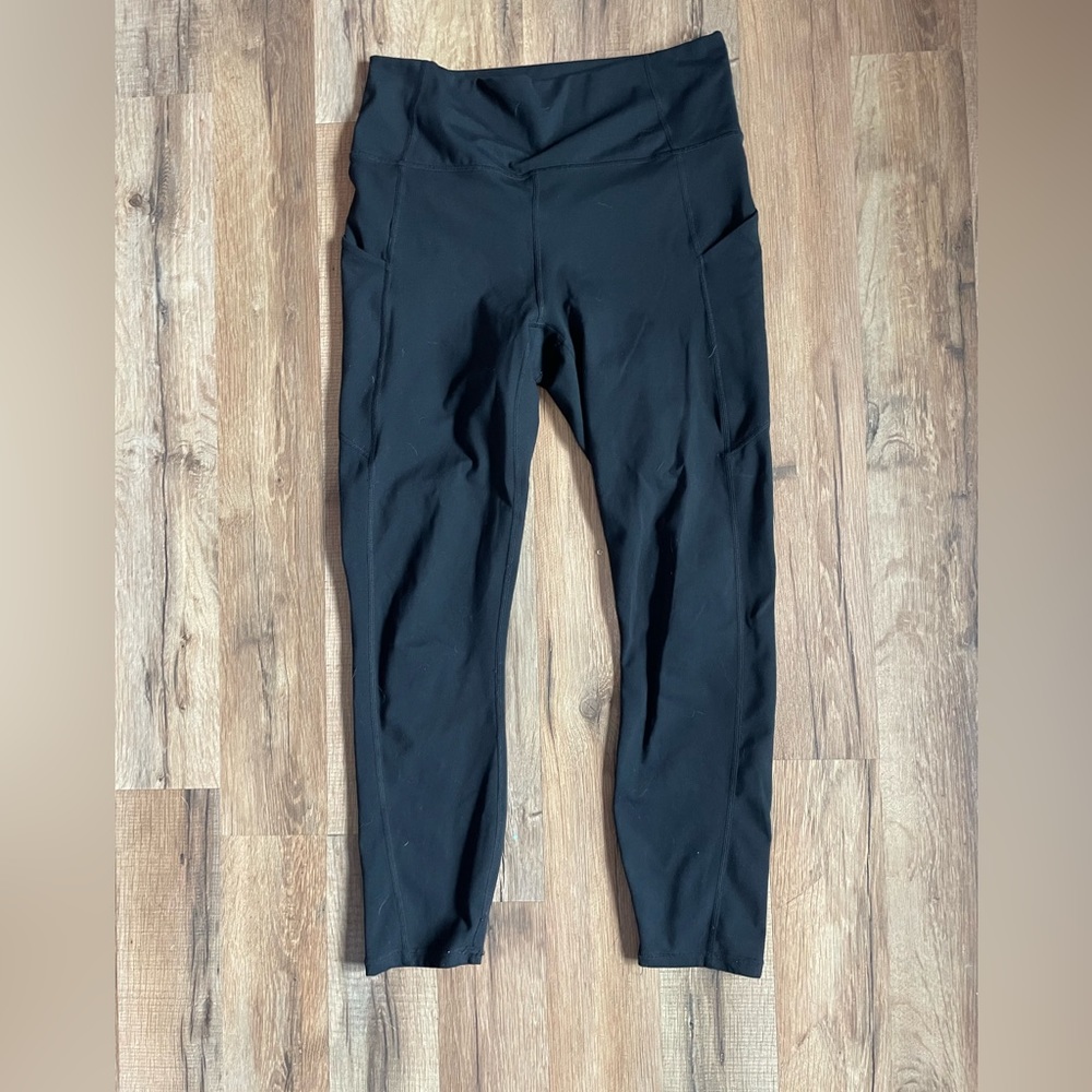 cute black fabletics leggings! no holes and have side pockets!